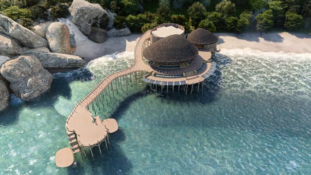 Khu lễ tân mái lá bên biển nhìn từ trên cao — Six Senses Ninh Van Bay, Khánh Hòa, Việt Nam